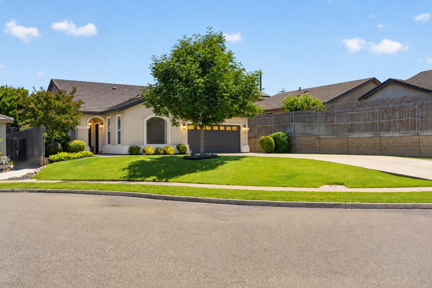 437 Silver Ridge Court Oakdale, CA 95361 - Photo 1 of 41 a view of a house with a big yard and large trees