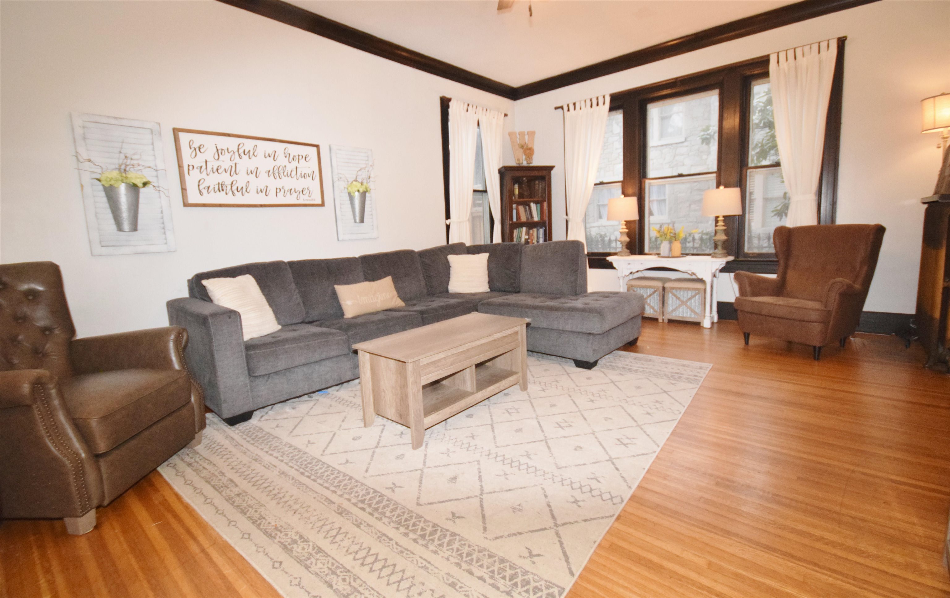 263 Stonewall Street Memphis, TN 38112 - Photo 11 of 25 a living room with furniture and large windows
