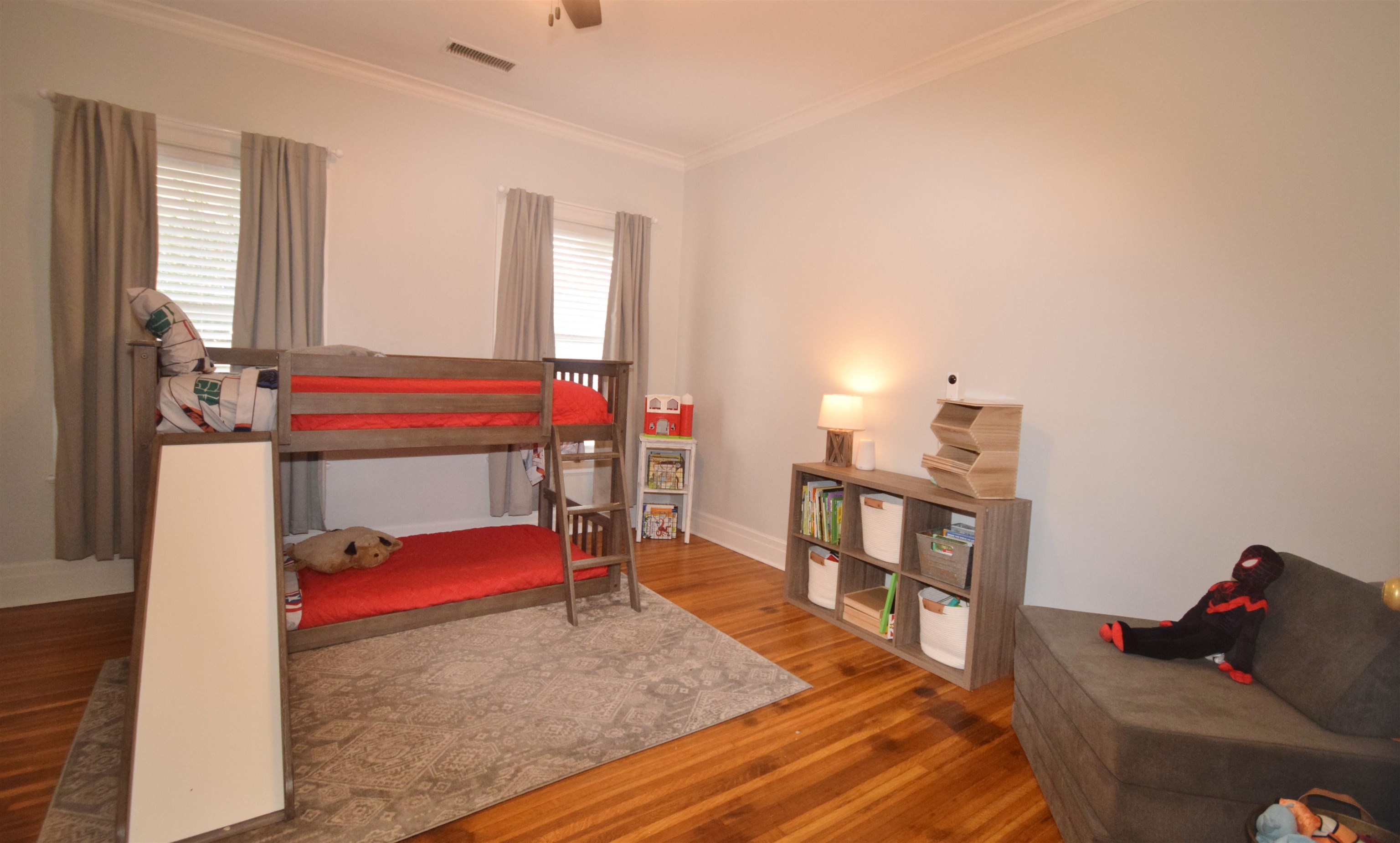 263 Stonewall Street Memphis, TN 38112 - Photo 17 of 25 a bedroom with a bed and a window