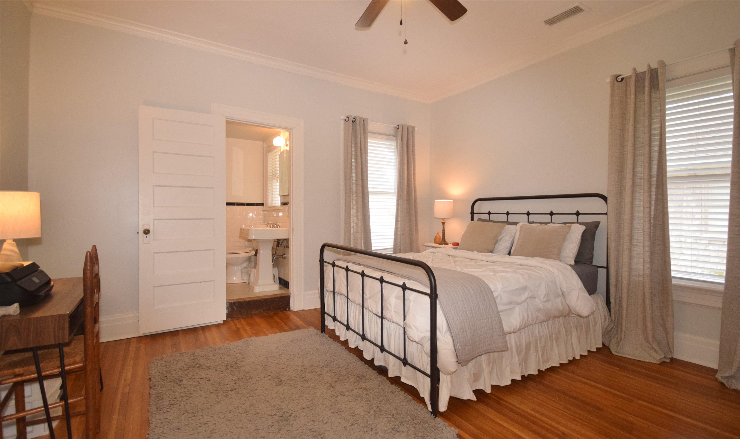 263 Stonewall Street Memphis, TN 38112 - Photo 18 of 25 a bedroom with a bed and a window