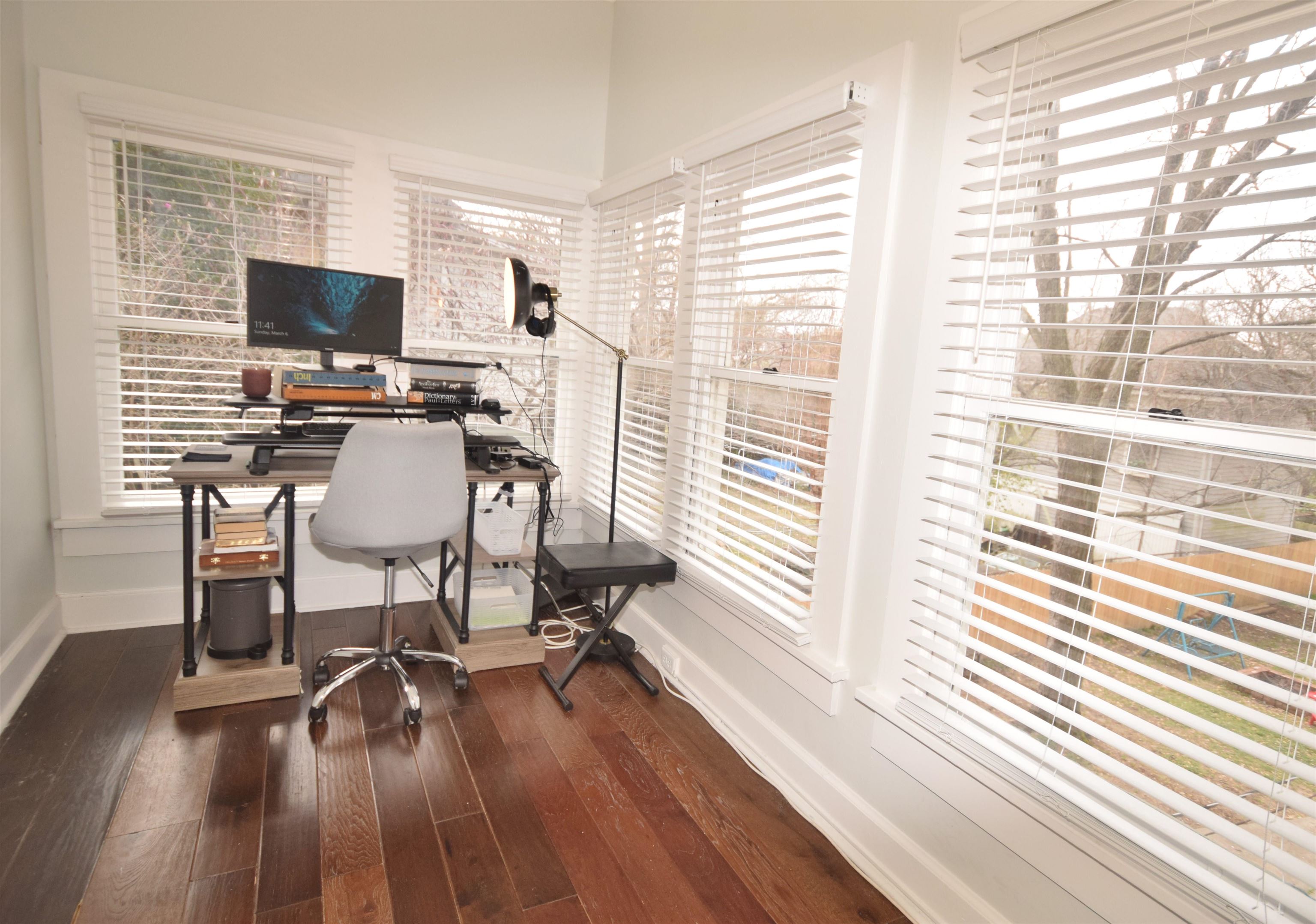 263 Stonewall Street Memphis, TN 38112 - Photo 22 of 25 a view of a workspace with furniture and a window