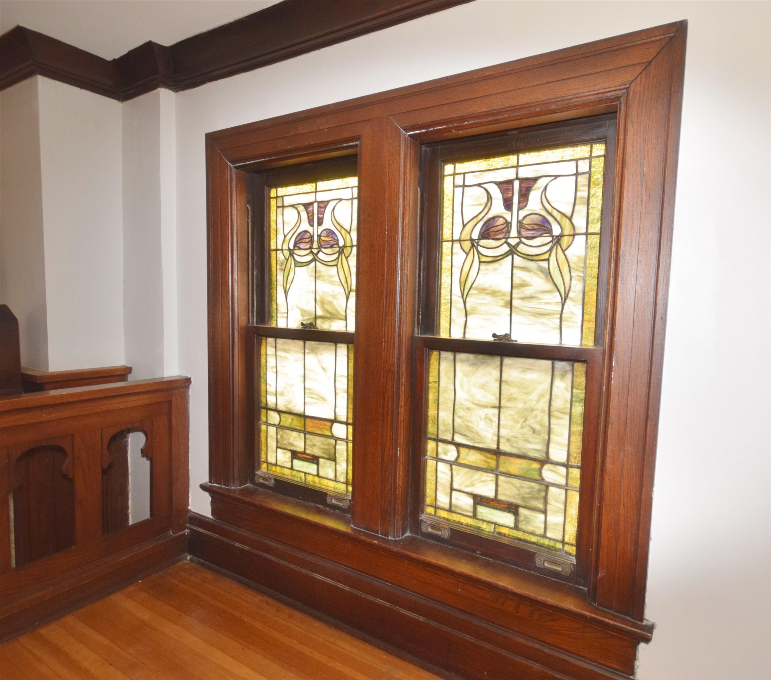 263 Stonewall Street Memphis, TN 38112 - Photo 5 of 25 a view of an empty room with wooden floor and a window