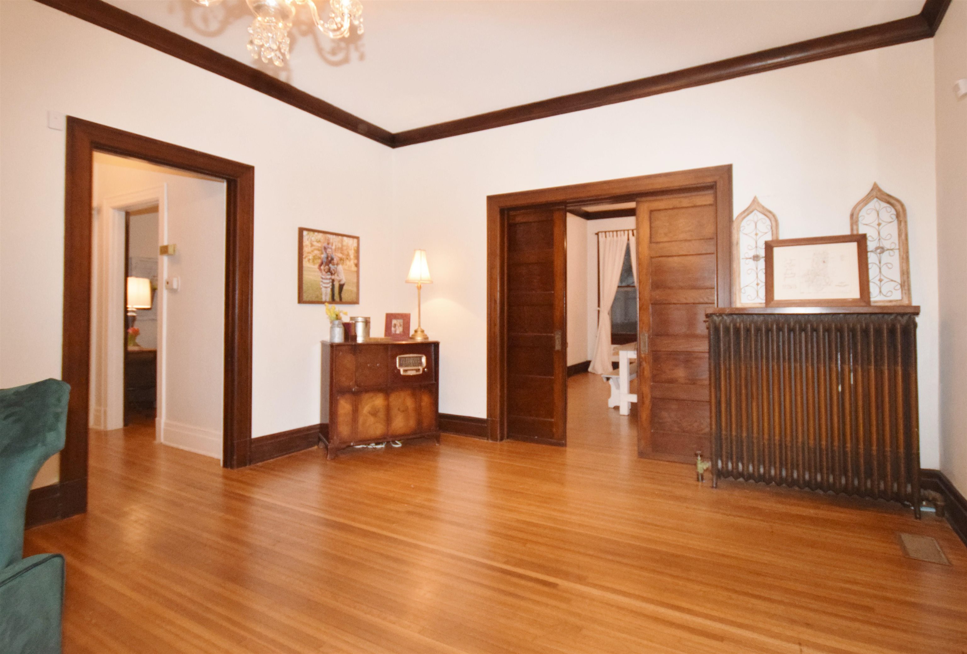 263 Stonewall Street Memphis, TN 38112 - Photo 6 of 25 a view of a livingroom with wooden floor and furniture