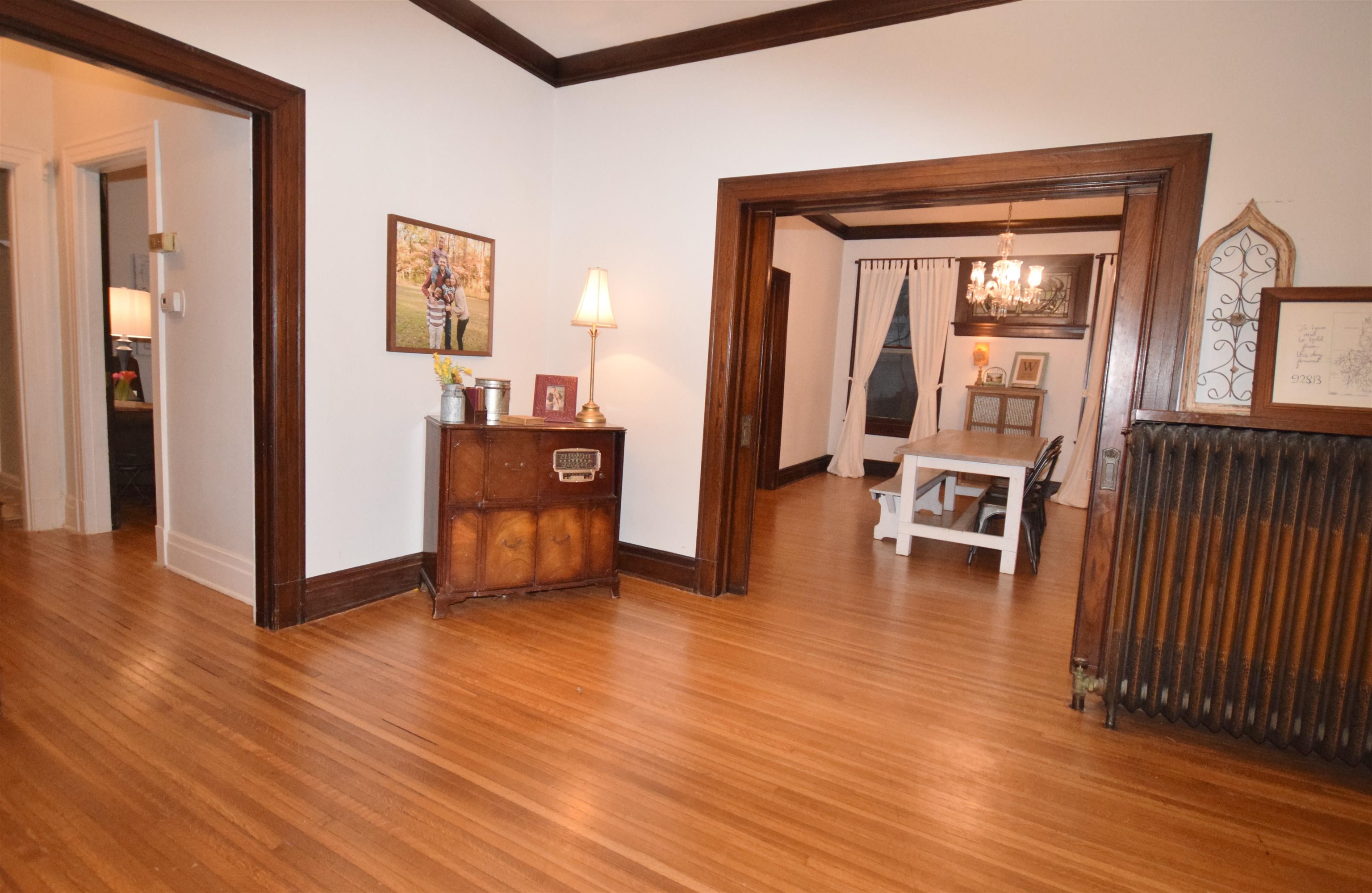263 Stonewall Street Memphis, TN 38112 - Photo 7 of 25 a living room with furniture and a wooden floor