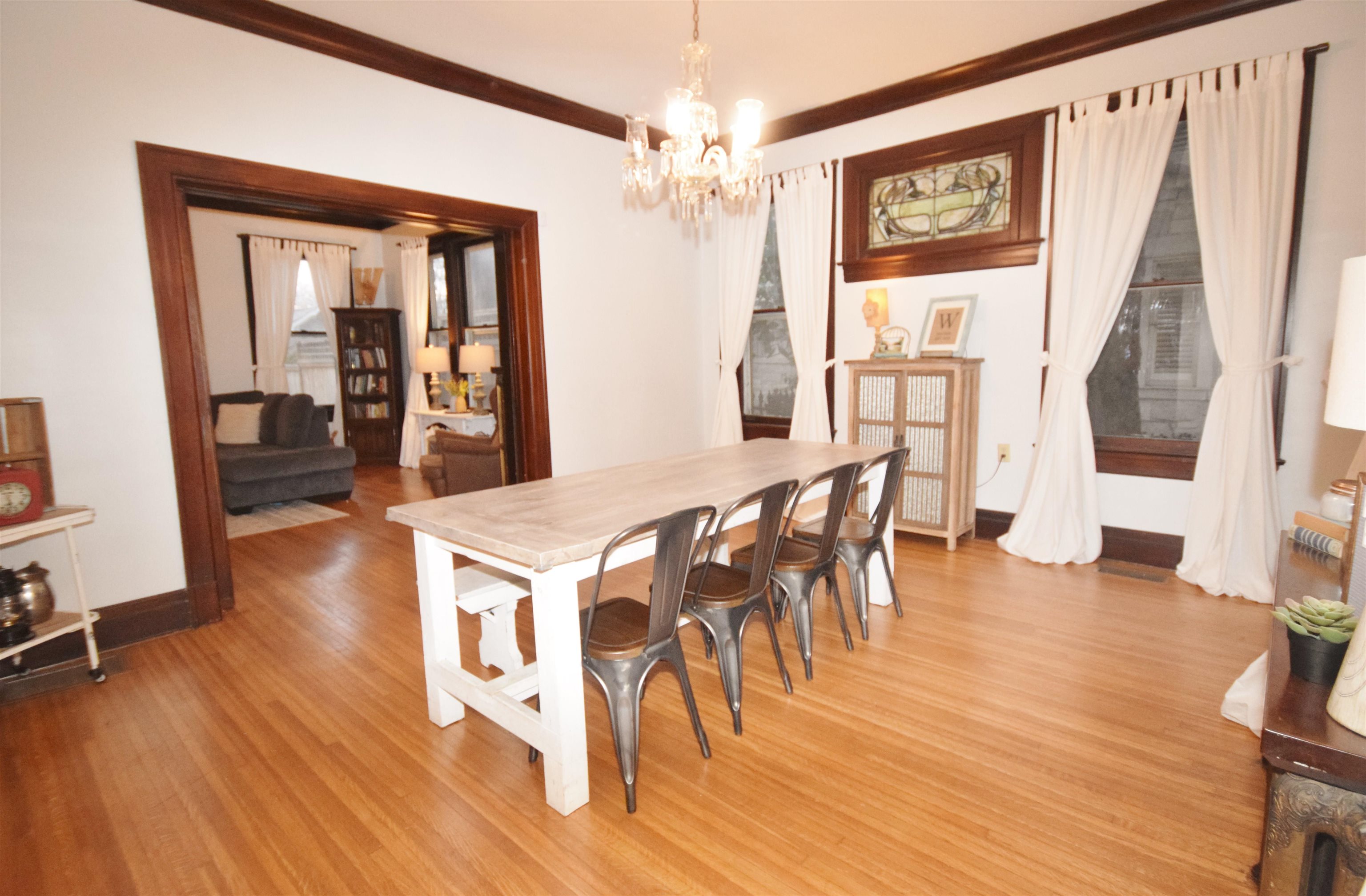 263 Stonewall Street Memphis, TN 38112 - Photo 8 of 25 a view of a livingroom with furniture wooden floor and windows
