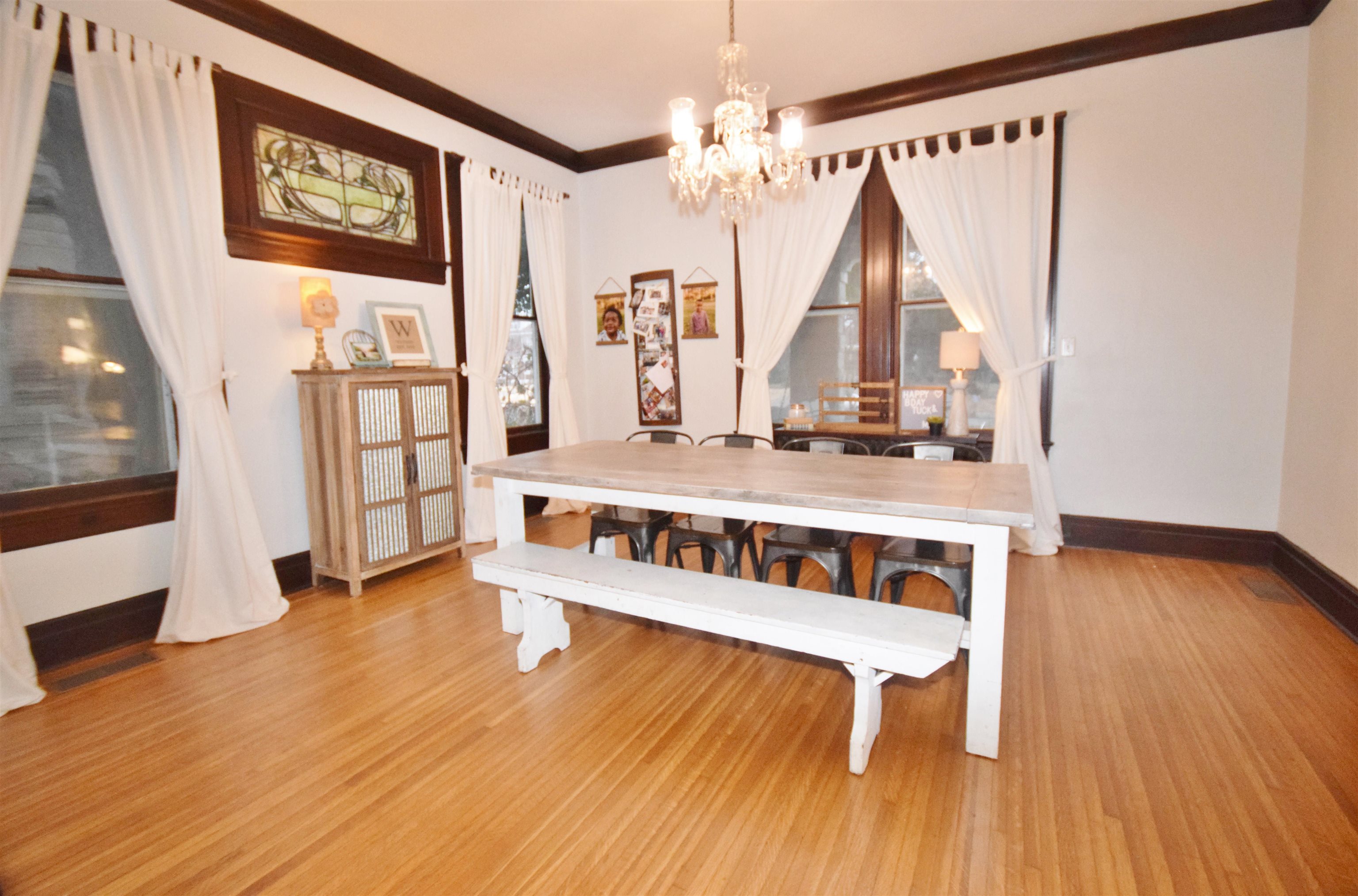 263 Stonewall Street Memphis, TN 38112 - Photo 9 of 25 a view of staircase with white walls and a wooden floor