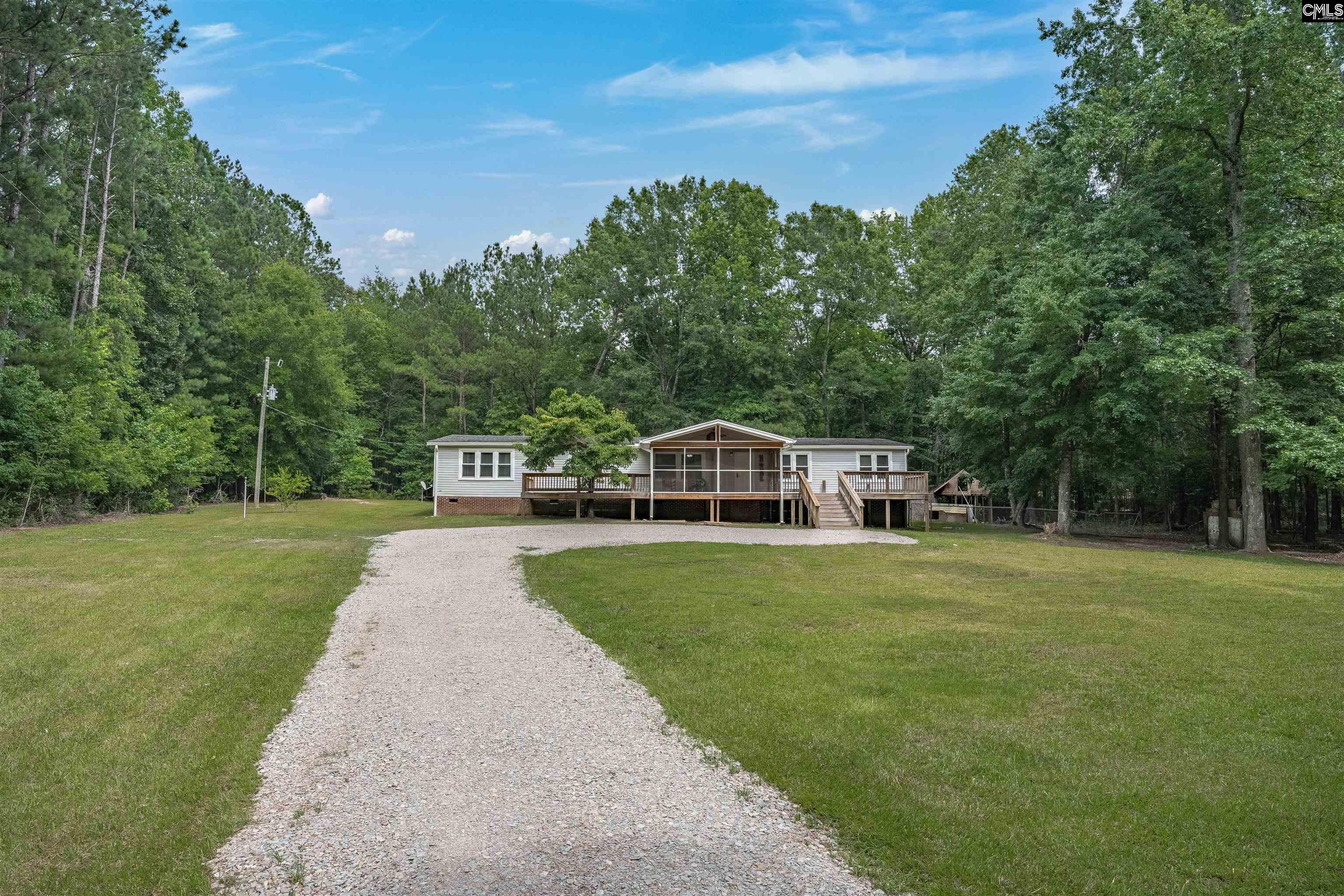304 Cooper Road Blythewood, SC 29016 - Photo 2 of 29 a front view of a house with a yard