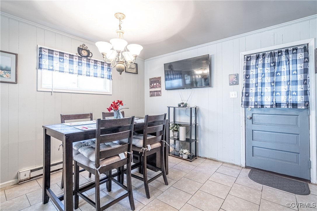 5316 Germain Road Richmond, VA 23224 - Photo 7 of 20 Dining area with ornamental molding, light tile pa