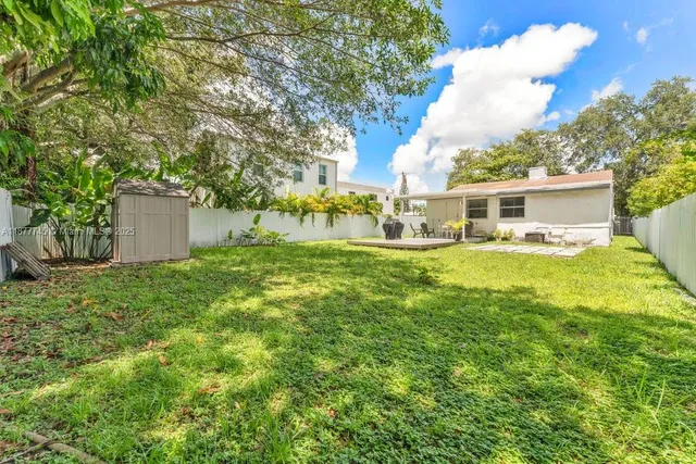 a view of a house with a big yard