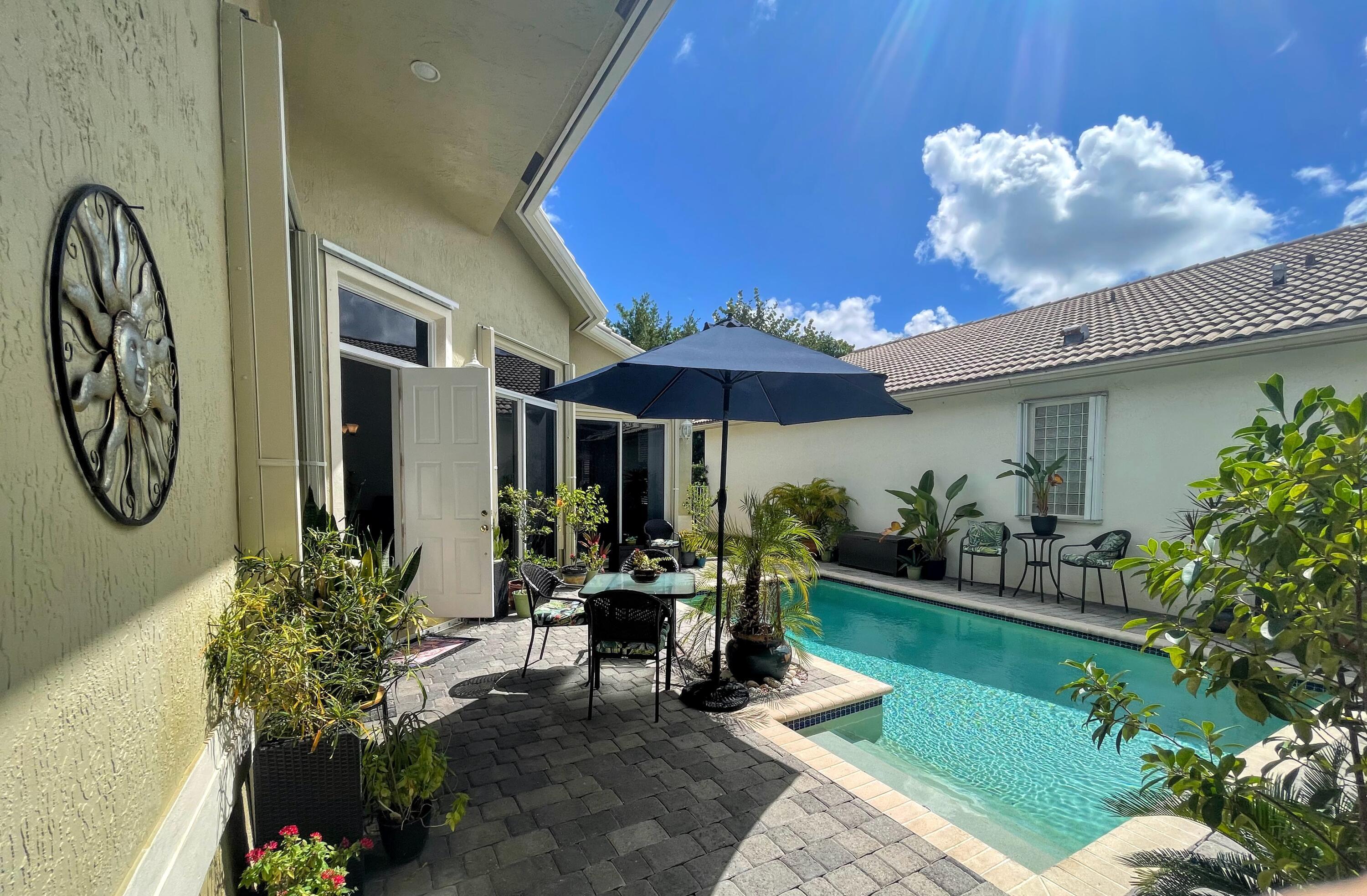 7060 Northwest Turtle Walk Boca Raton, FL 33487 - Photo 10 of 51 Courtyard