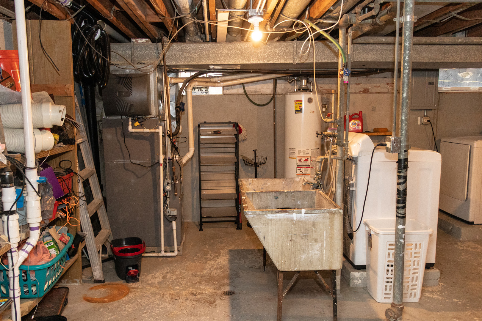 1488 Willow Avenue Des Plaines, IL 60016 - Photo 22 of 25 a view of walk in closet with clothes and shoes