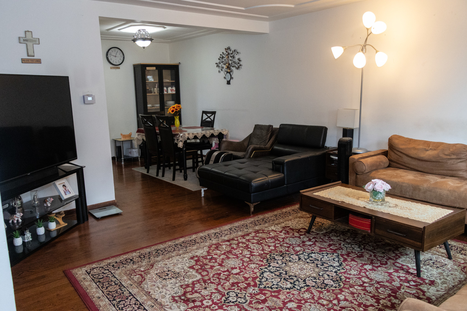 1488 Willow Avenue Des Plaines, IL 60016 - Photo 3 of 25 a living room with furniture and a flat screen tv