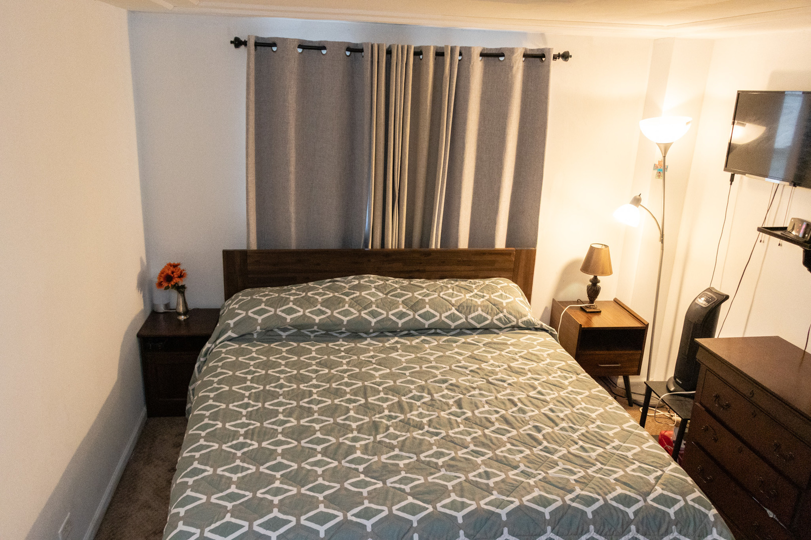 1488 Willow Avenue Des Plaines, IL 60016 - Photo 8 of 25 a bedroom with a bed and wooden floor