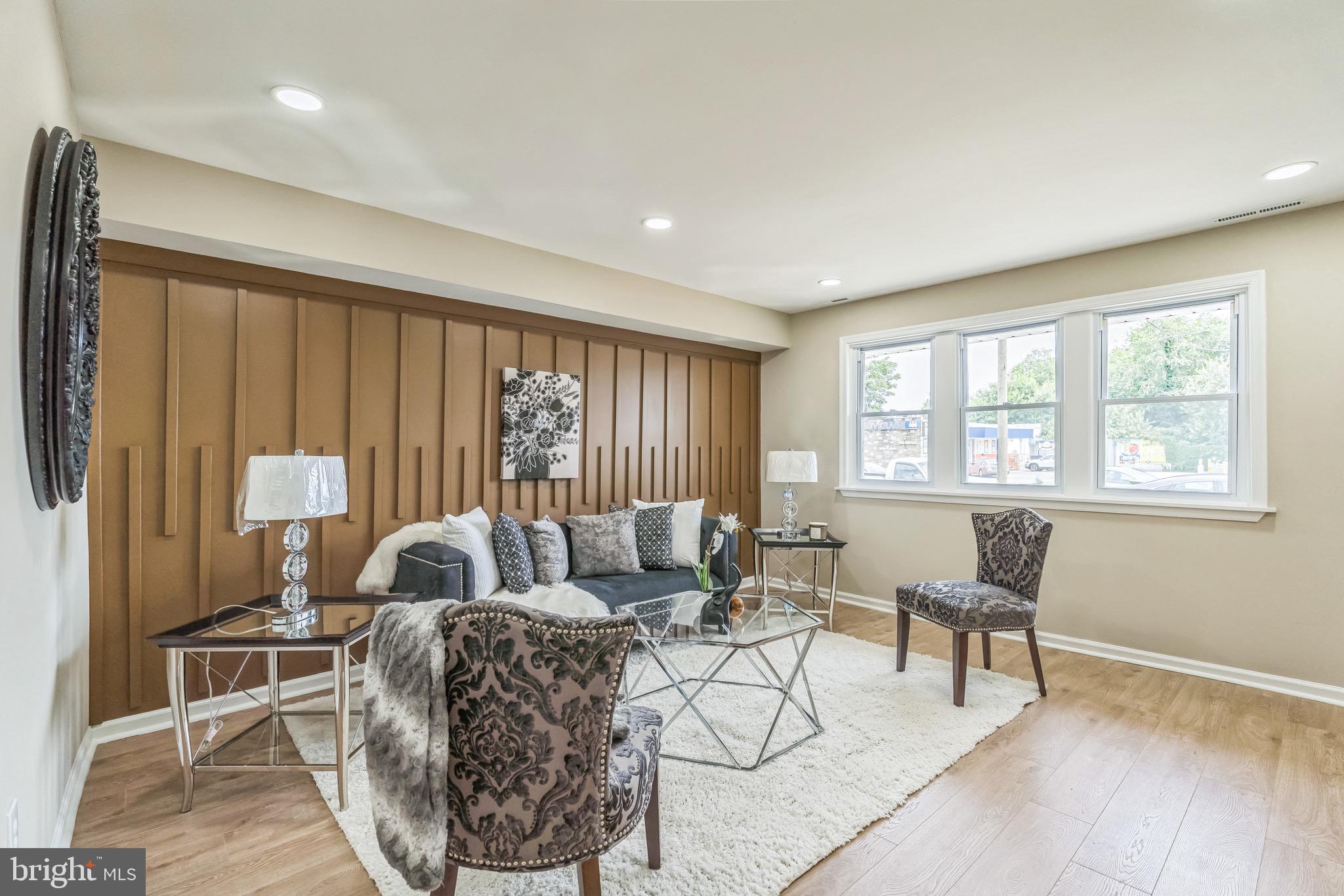 5734 Harbison Avenue Philadelphia, PA 19135 - Photo 1 of 29 a living room with furniture and a window