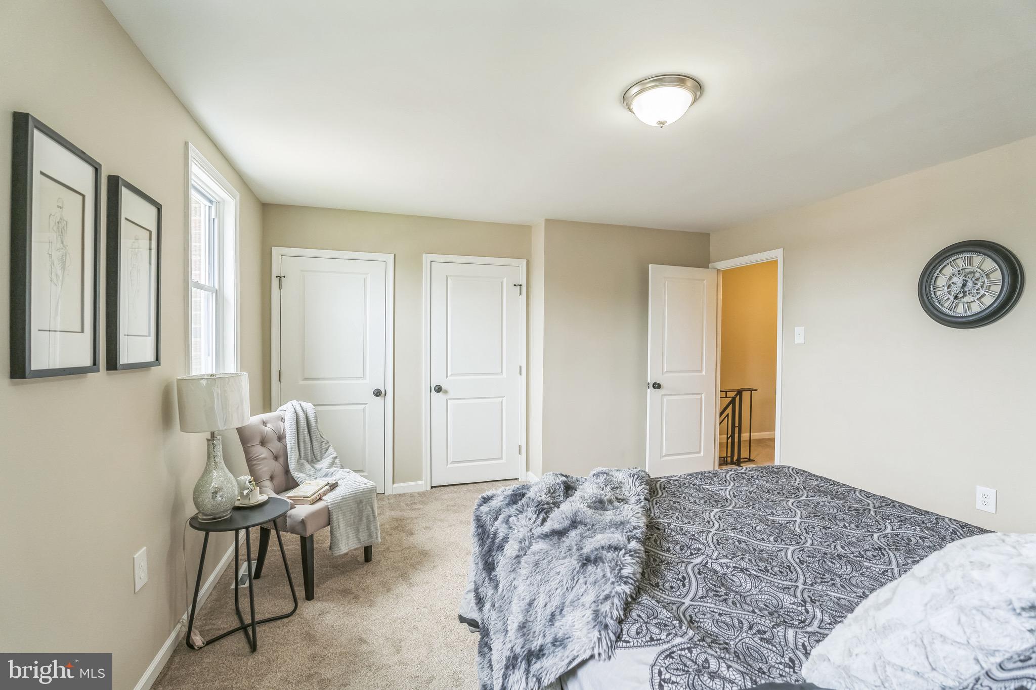 5734 Harbison Avenue Philadelphia, PA 19135 - Photo 13 of 29 a bedroom with a bed and chair