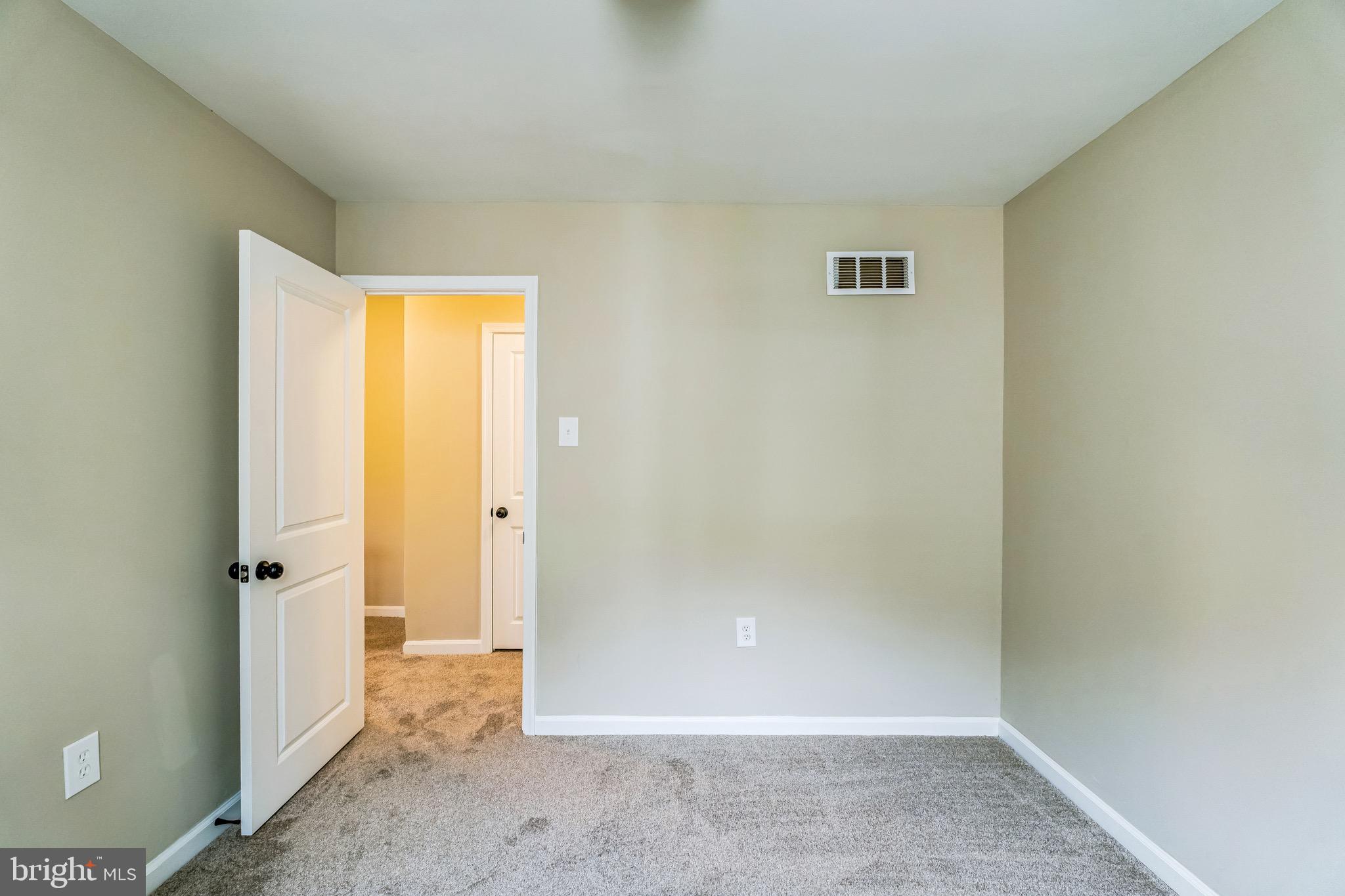 5734 Harbison Avenue Philadelphia, PA 19135 - Photo 17 of 29 a view of a bathroom with a glass door and a window