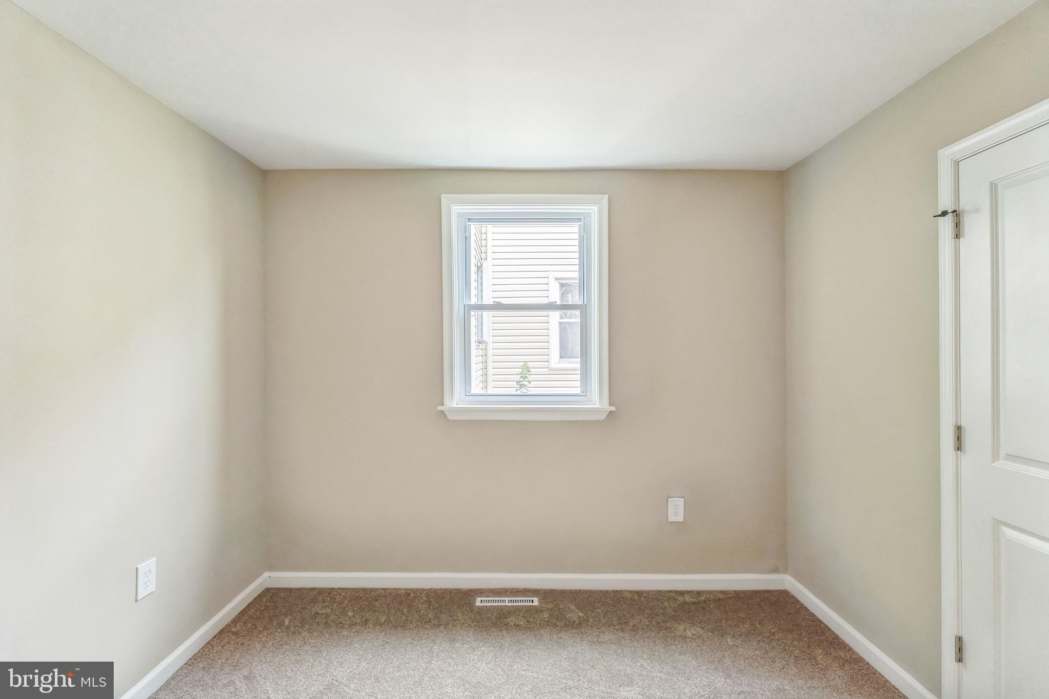 5734 Harbison Avenue Philadelphia, PA 19135 - Photo 25 of 29 an empty room with a window