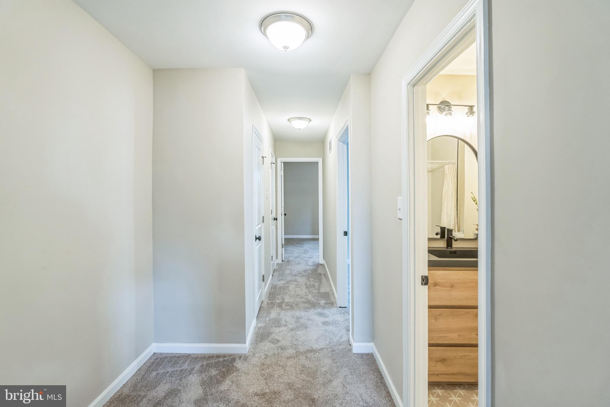 5734 Harbison Avenue Philadelphia, PA 19135 - Photo 26 of 29 a view of a bathroom from a hallway