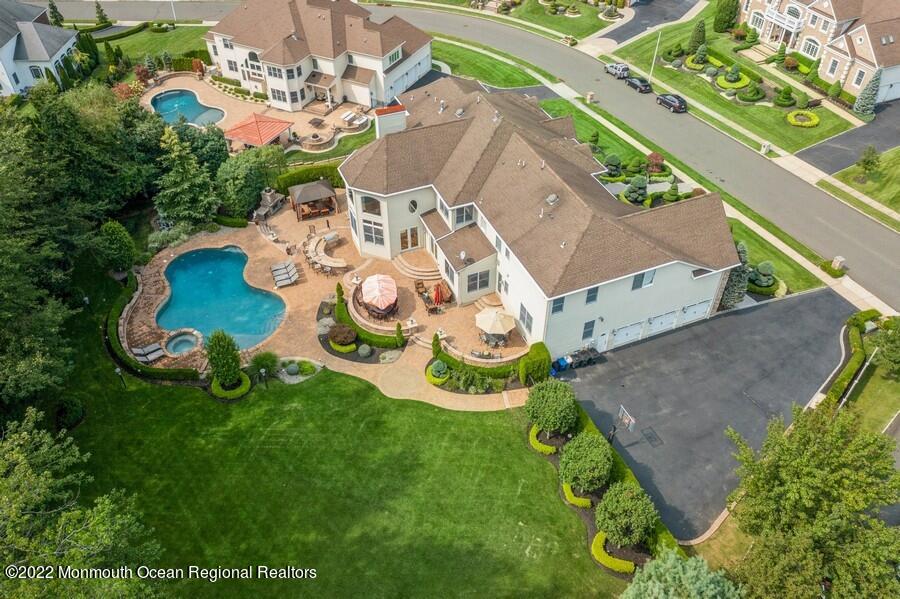 72 Edgewood Road Morganville, NJ 07751 - Photo 14 of 86 an aerial view of a house with a garden