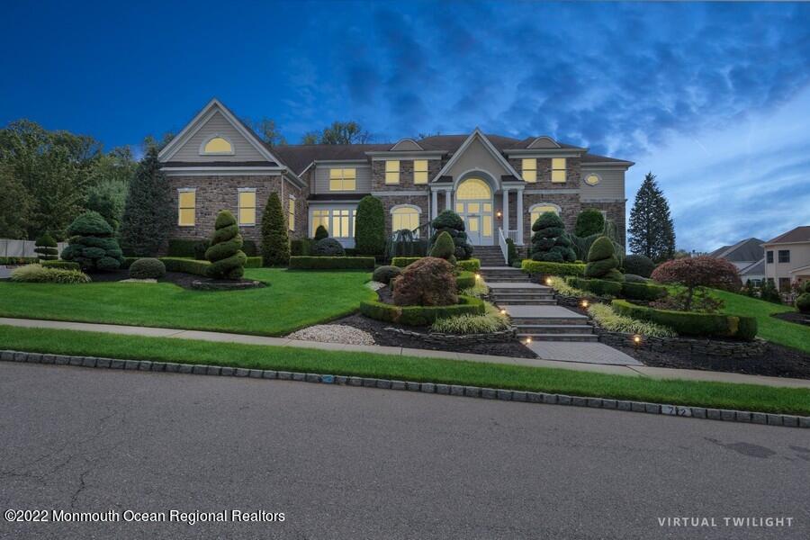 72 Edgewood Road Morganville, NJ 07751 - Photo 2 of 86 a front view of a house with a yard