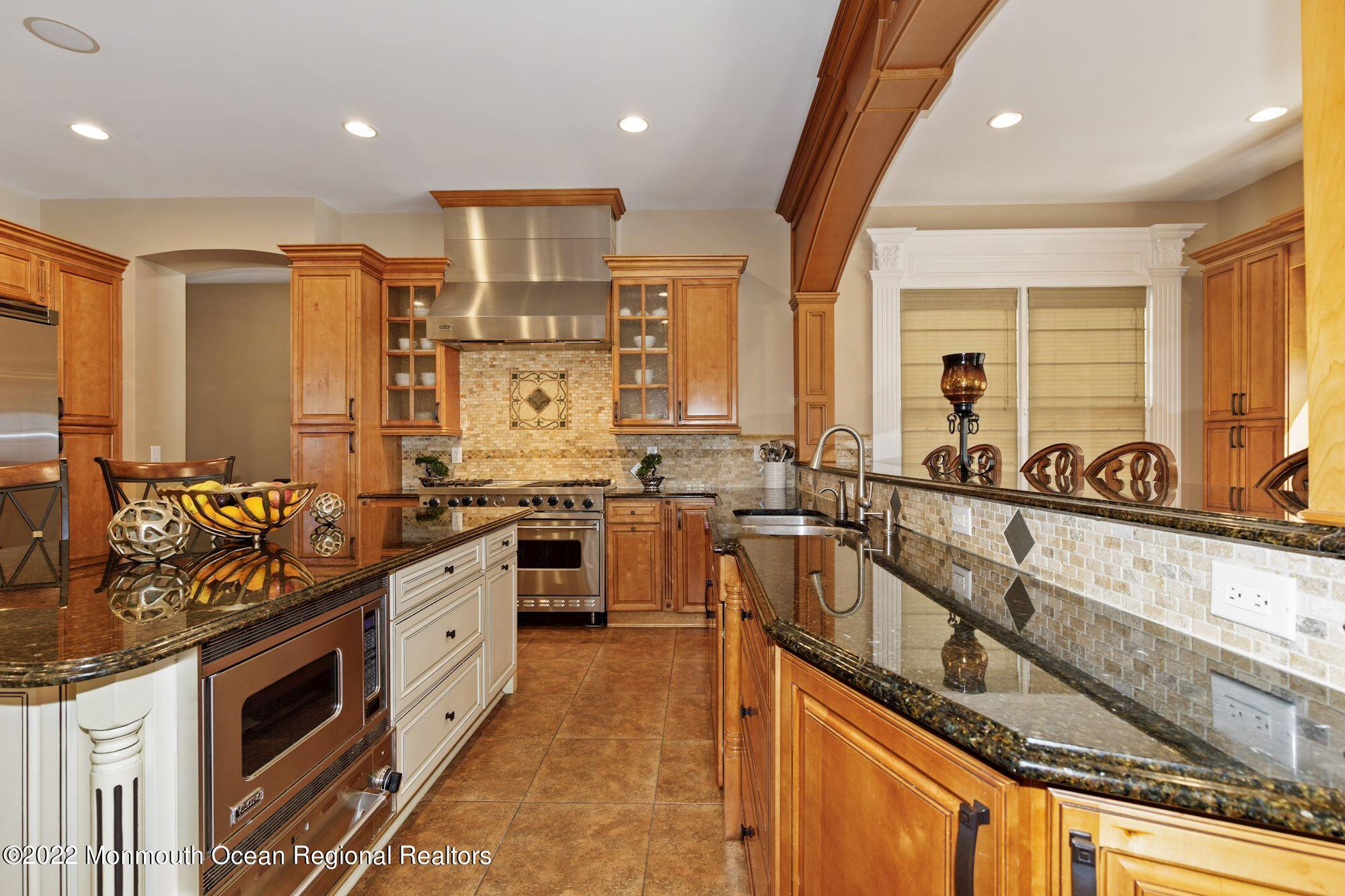72 Edgewood Road Morganville, NJ 07751 - Photo 29 of 86 a kitchen with lots of counter top space