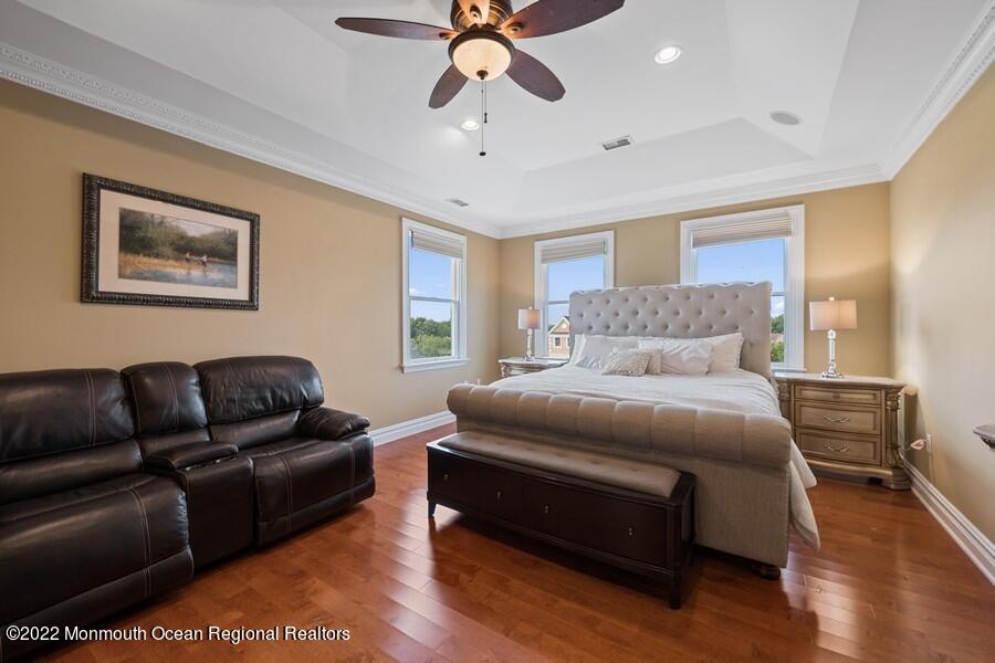 72 Edgewood Road Morganville, NJ 07751 - Photo 40 of 86 a bedroom with a bed couch and window