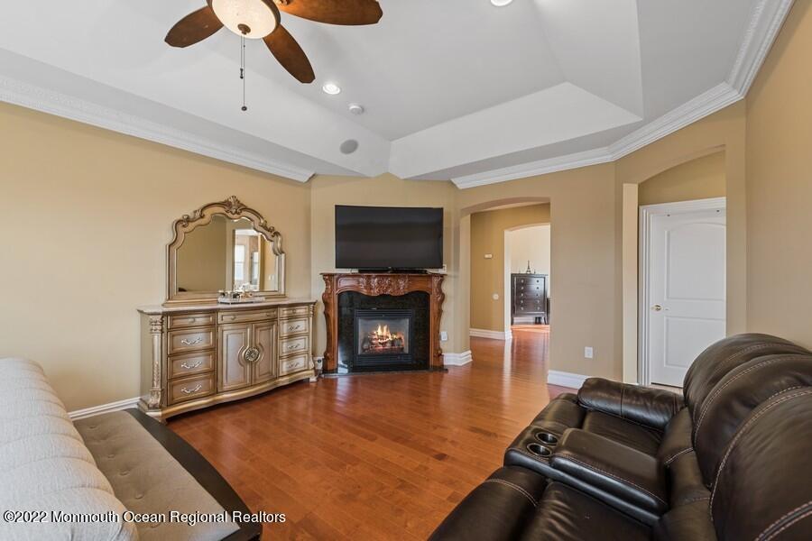 72 Edgewood Road Morganville, NJ 07751 - Photo 41 of 86 a living room with furniture and a flat screen tv