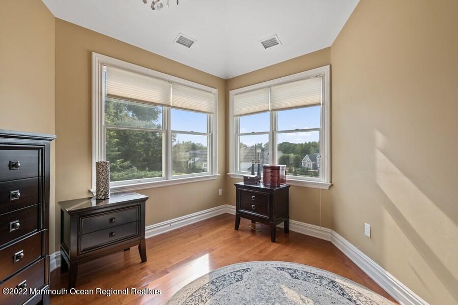 72 Edgewood Road Morganville, NJ 07751 - Photo 42 of 86 a living room with furniture and a window