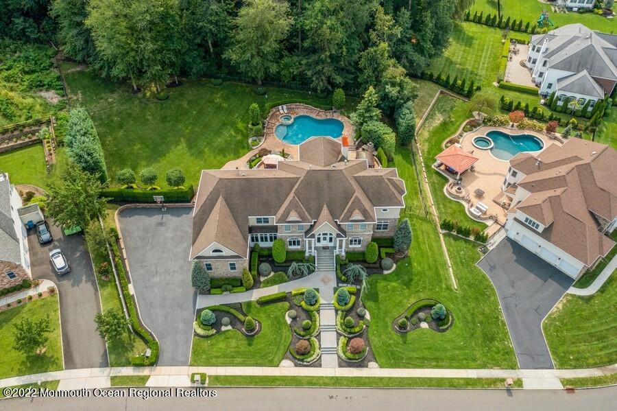 72 Edgewood Road Morganville, NJ 07751 - Photo 7 of 86 an aerial view of a house with garden space and street view