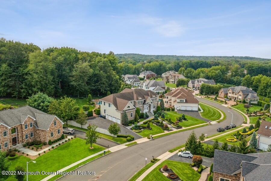 72 Edgewood Road Morganville, NJ 07751 - Photo 9 of 86 an aerial view of residential house with outdoor space and trees all around
