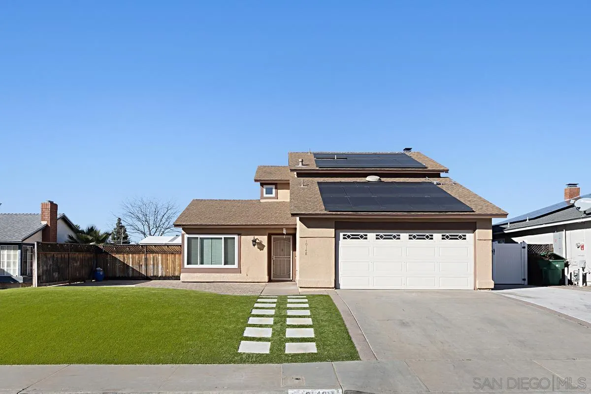 10148 East Glendon Circle Santee, CA 92071 - Photo 1 of 33 a front view of a house with a yard