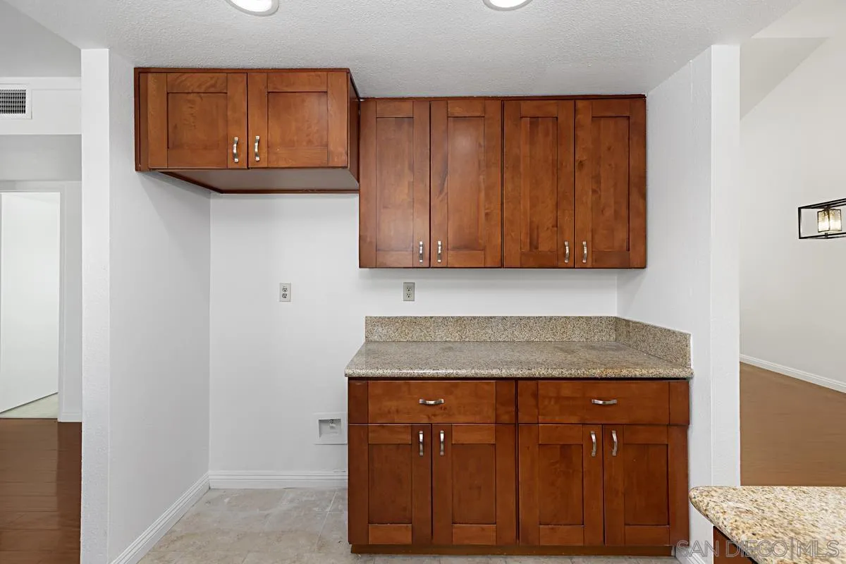 10148 East Glendon Circle Santee, CA 92071 - Photo 13 of 33 a view of cabinets and wooden floor