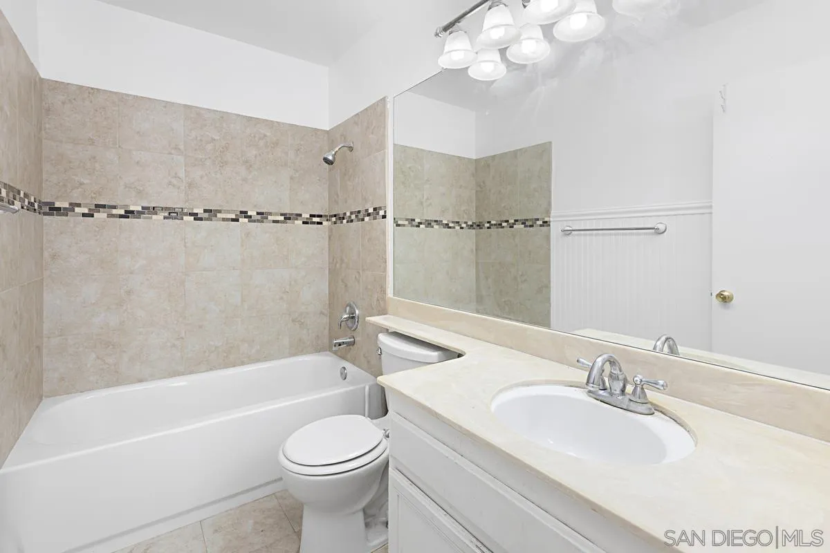 10148 East Glendon Circle Santee, CA 92071 - Photo 15 of 33 a bathroom with a sink a toilet and a bathtub