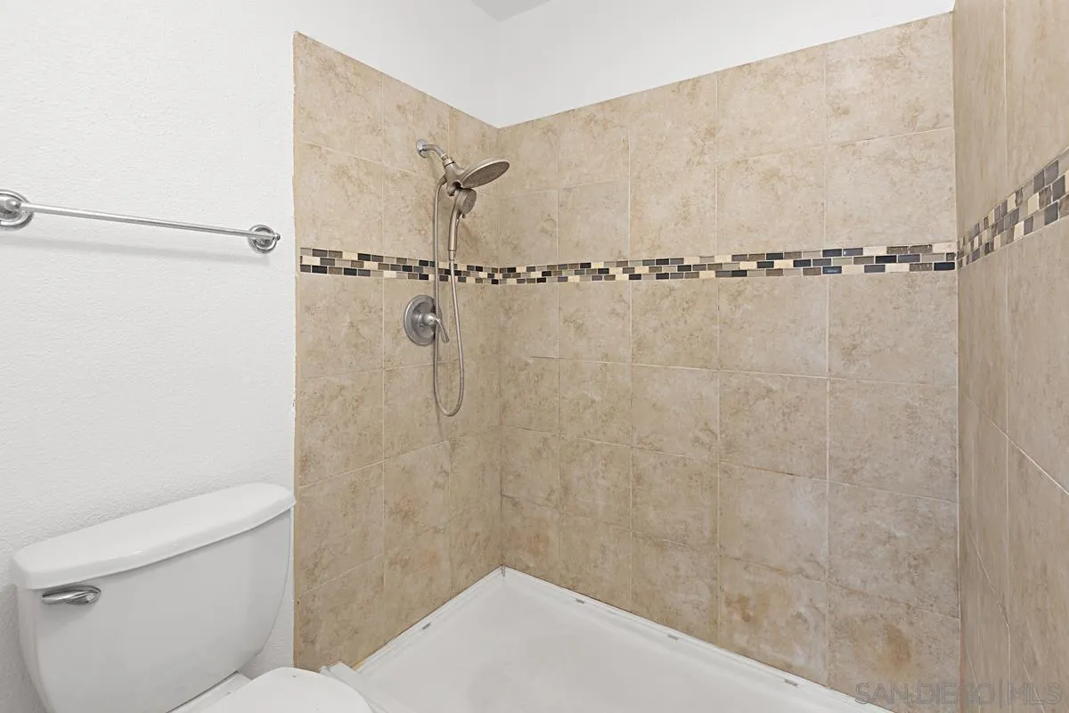 10148 East Glendon Circle Santee, CA 92071 - Photo 19 of 33 a bathroom with a shower and a toilet