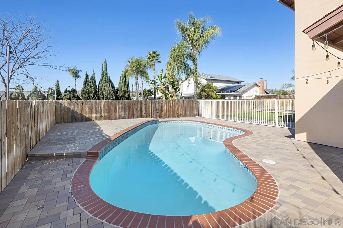 10148 East Glendon Circle Santee, CA 92071 - Photo 27 of 33 swimming pool view with a garden space