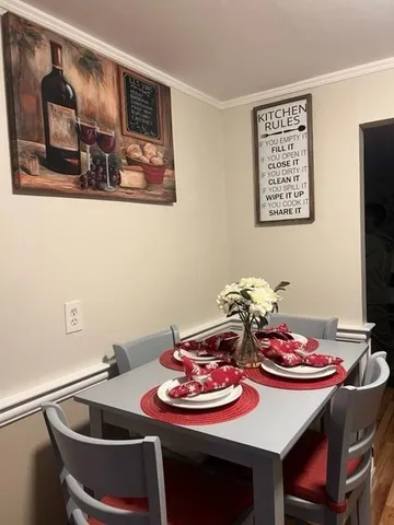 a view of a dining room with furniture