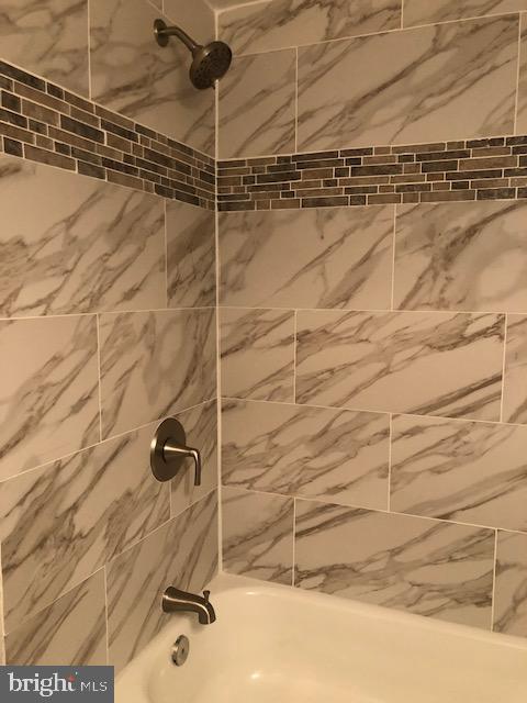 3835 St Barnabas Road, Unit 201 Suitland, MD 20746 - Photo 12 of 13 a bathroom with a shower