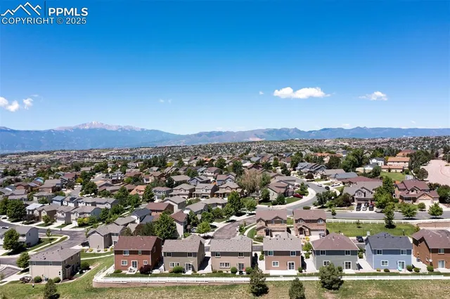 a view of a house with a big yard