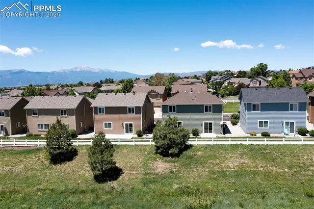 a room with lots of green space