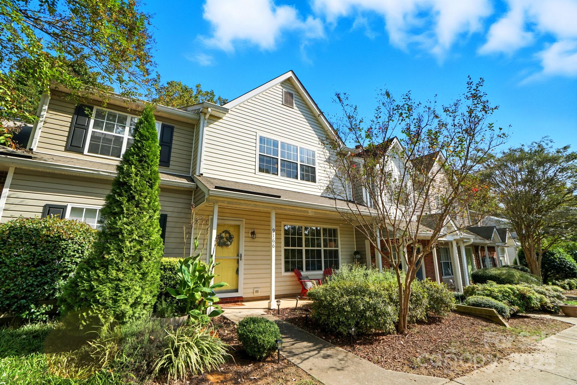 9166 Exbury Court Charlotte, NC 28269 - Photo 1 of 31 front view of a house with a yard