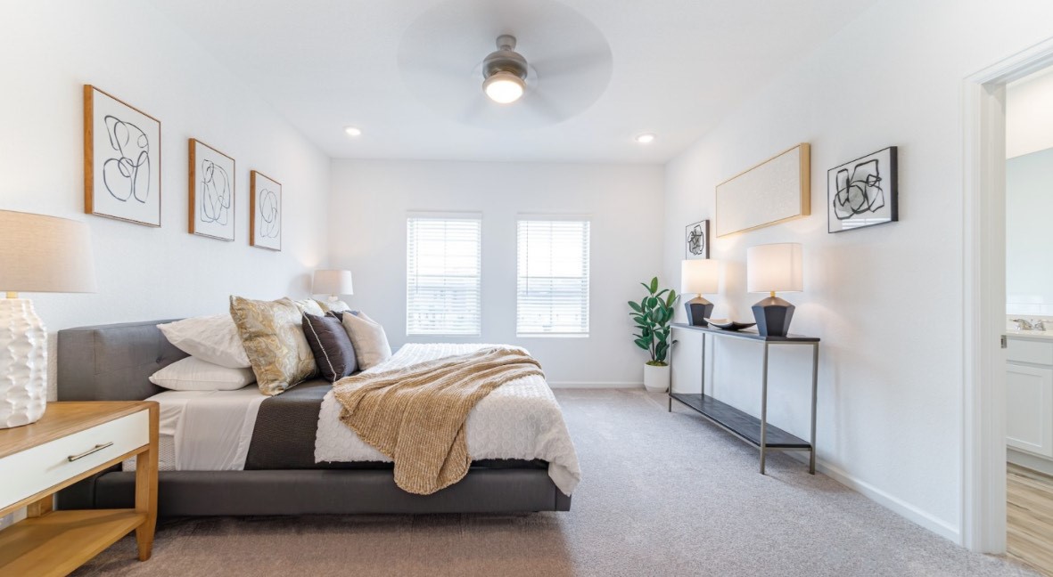 9910 Kilkenny Street Rosharon, TX 77583 - Photo 3 of 10 a bed room with a bed and a couch