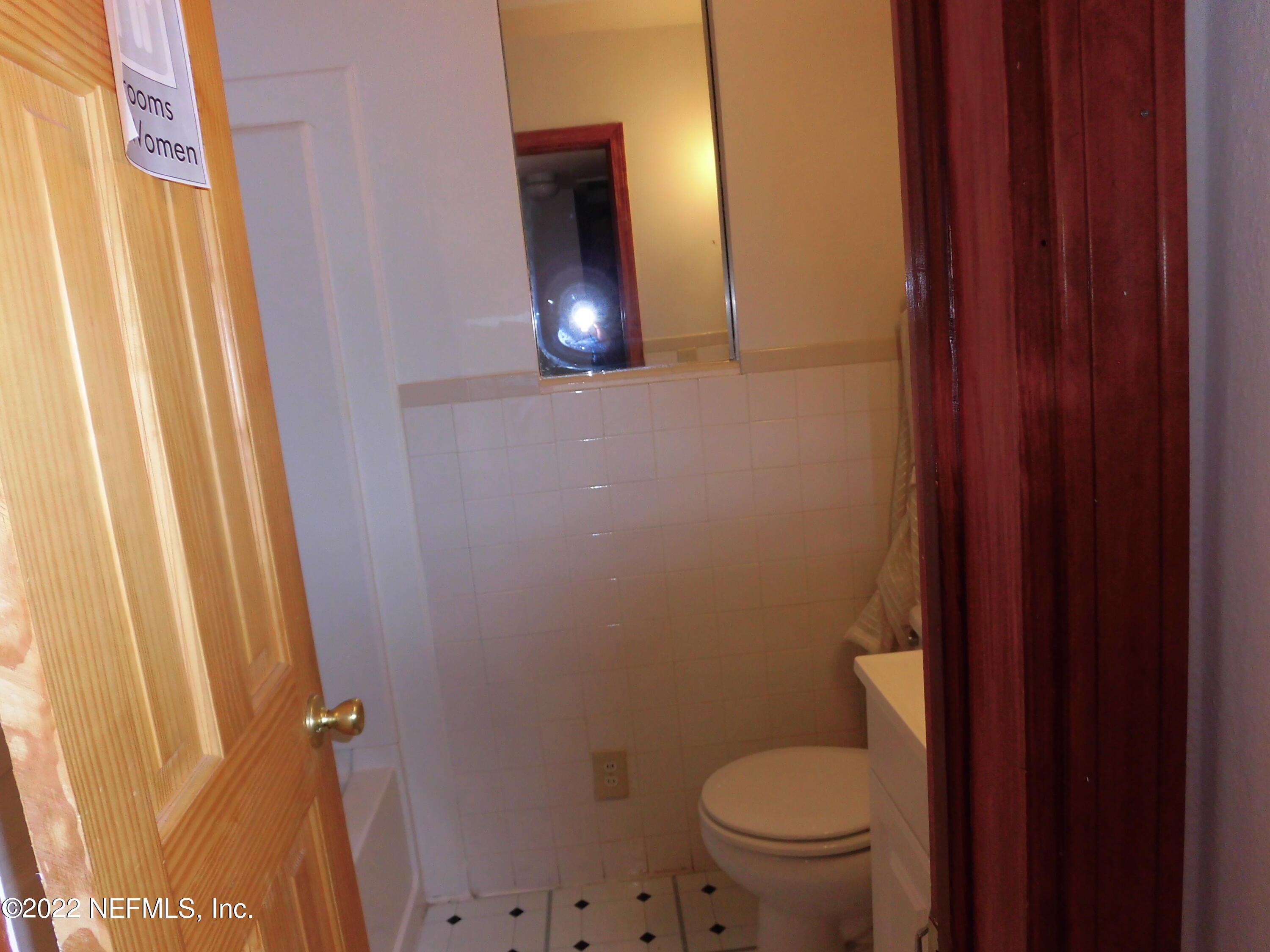 1750 Rogero Road Jacksonville, FL 32211 - Photo 14 of 35 a bathroom with a toilet and a sink