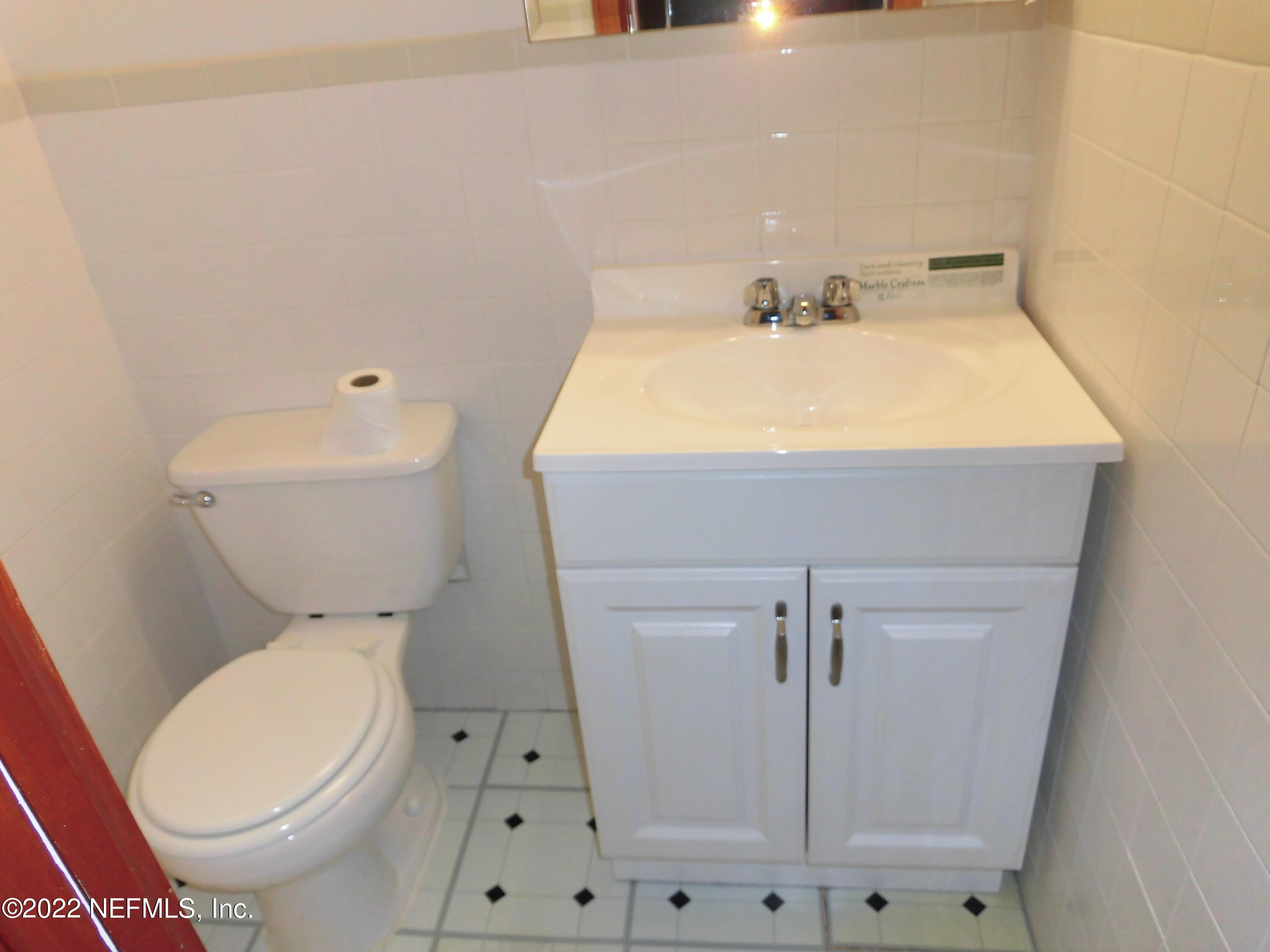 1750 Rogero Road Jacksonville, FL 32211 - Photo 17 of 35 a bathroom with a sink and toilet