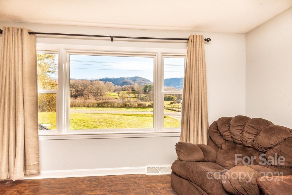 5196 Jenkins Road Morganton, NC 28655 - Photo 13 of 46 a living room with furniture and a window