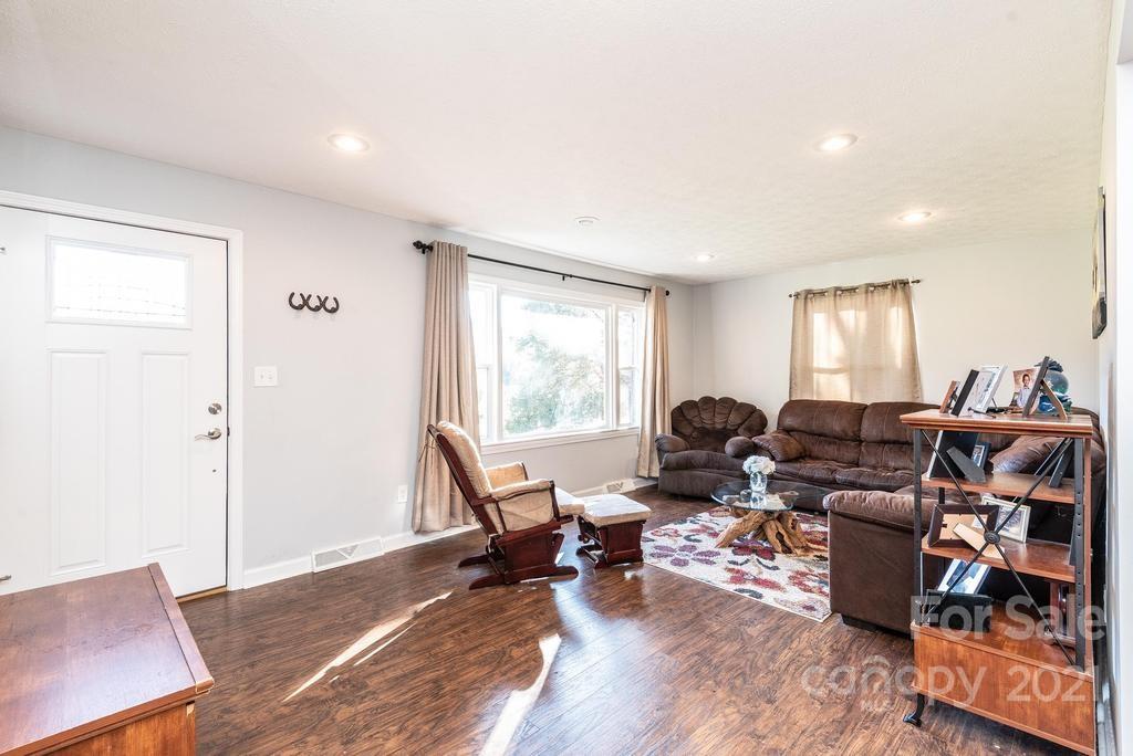 5196 Jenkins Road Morganton, NC 28655 - Photo 14 of 46 a living room with furniture window and wooden floor