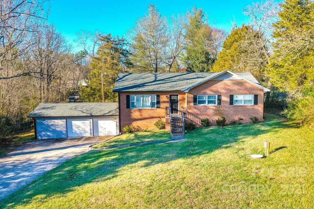5196 Jenkins Road Morganton, NC 28655 - Photo 2 of 46 a front view of a house with yard and green space