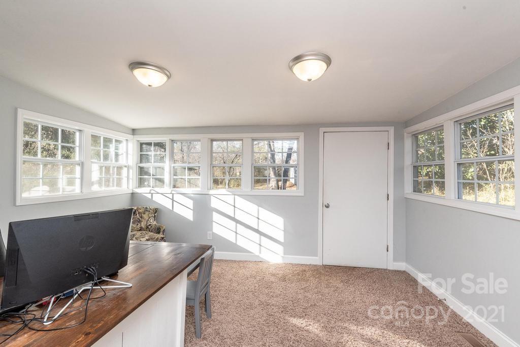 5196 Jenkins Road Morganton, NC 28655 - Photo 23 of 46 a view of workspace with wooden floor and windows