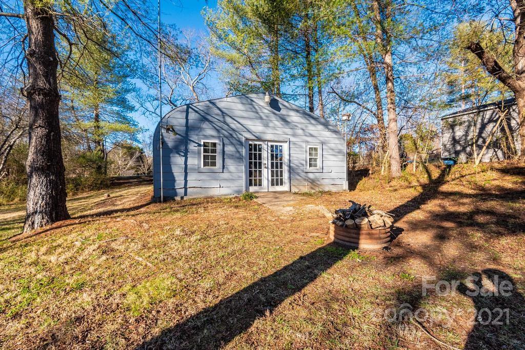 5196 Jenkins Road Morganton, NC 28655 - Photo 37 of 46 a house with trees in front of it