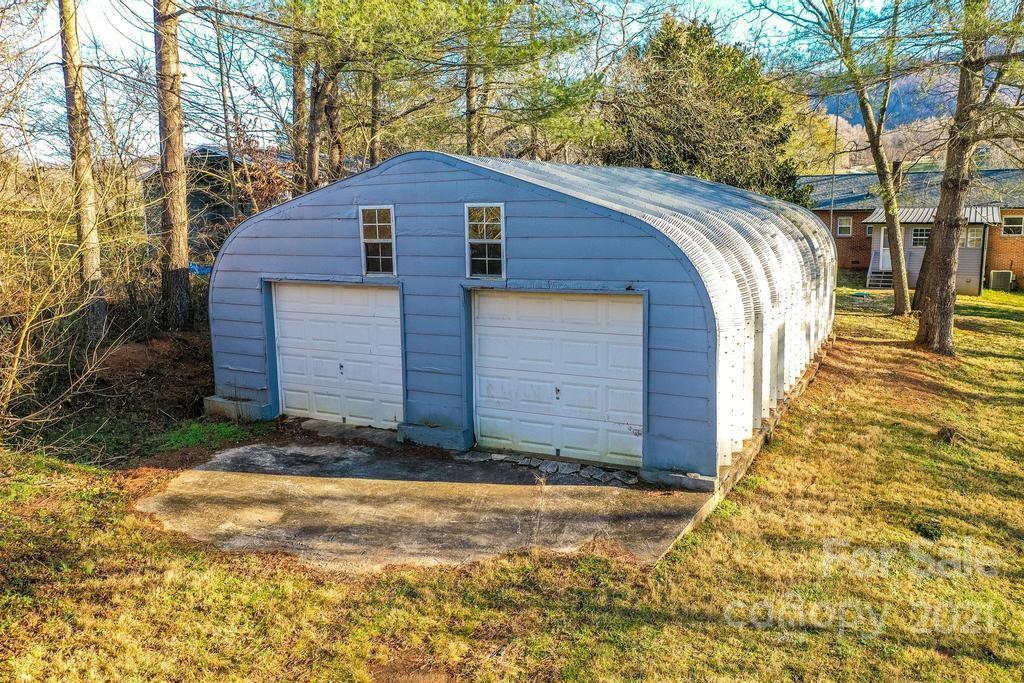 5196 Jenkins Road Morganton, NC 28655 - Photo 39 of 46 a view of a house with a yard