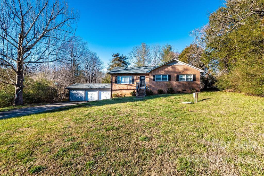 5196 Jenkins Road Morganton, NC 28655 - Photo 42 of 46 a house with swimming pool in front of it